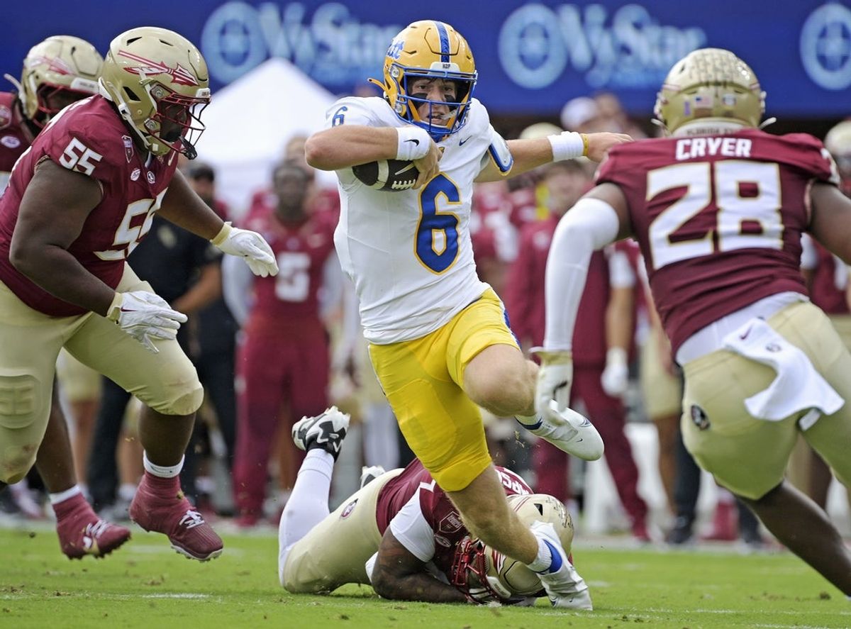 Oct 11, 2025; Tallahassee, Florida, USA; Pittsburgh Panthers quarterback Mason Heintschel (6) runs the ball in the first quarter against the Florida State Seminoles at Doak S. Campbell Stadium. Mandatory Credit: Melina Myers-Imagn Images