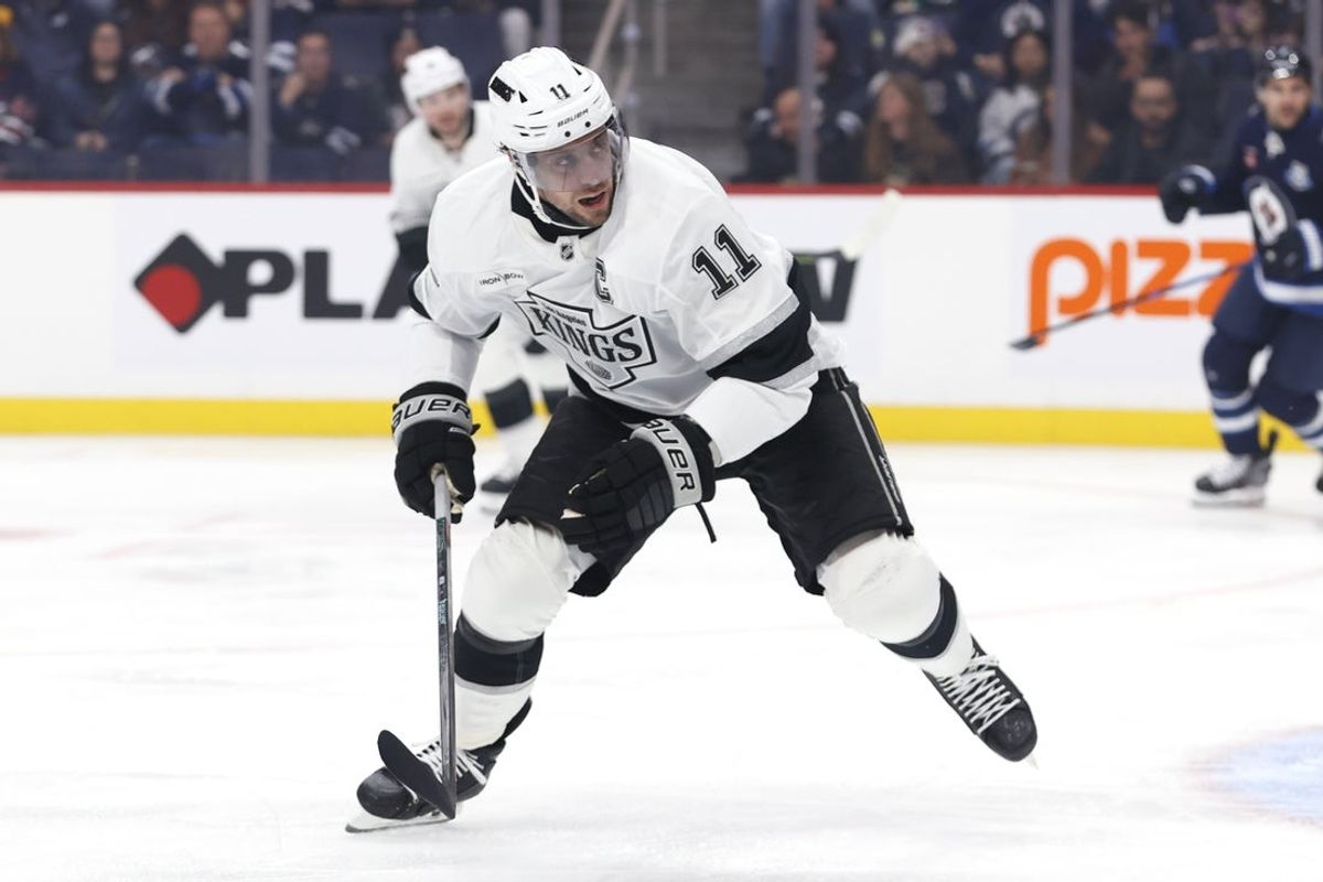 Oct 11, 2025; Winnipeg, Manitoba, CAN; Los Angeles Kings center Anze Kopitar (11) watches the play during a game against the Winnipeg Jets in the first period at Canada Life Centre. Mandatory Credit: James Carey Lauder-Imagn Images