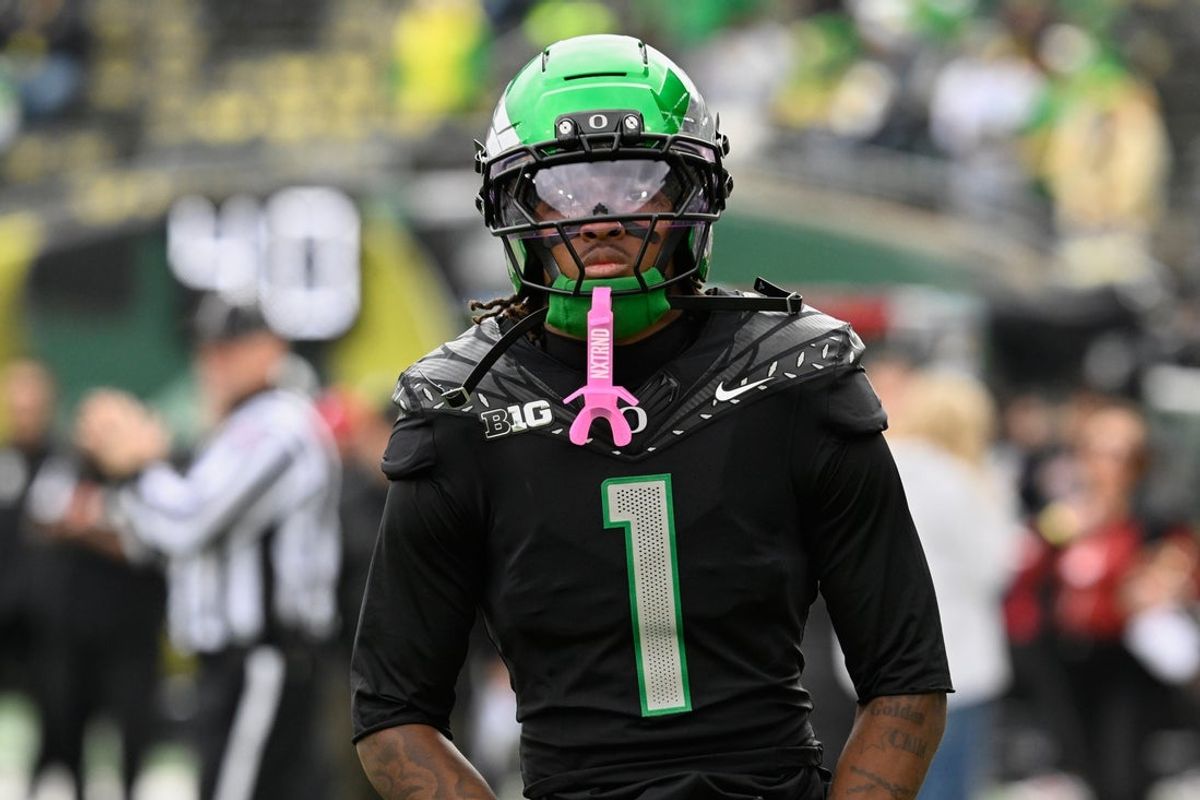 Oct 11, 2025; Eugene, Oregon, USA; Oregon Ducks wide receiver Dakorien Moore (1) warms up before the game against the Indiana Hoosiers at Autzen Stadium. Mandatory Credit: Troy Wayrynen-Imagn Images