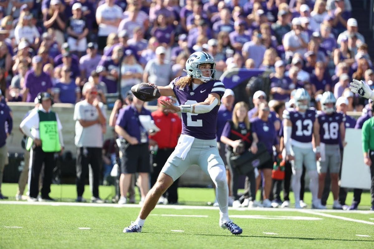 Oct 11, 2025; Manhattan, Kansas, USA; Kansas State Wildcats quarterback Avery Johnson (2) drops back to pass during the first quarter against the TCU Horned Frogs at Bill Snyder Family Football Stadium. Mandatory Credit: Scott Sewell-Imagn Images