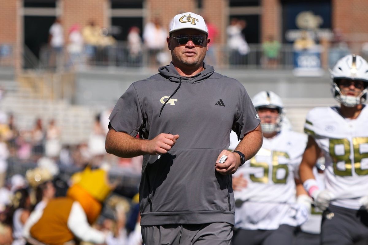 Oct 11, 2025; Atlanta, Georgia, USA; Georgia Tech Yellow Jackets head coach Brent Key runs on the field before a game against the Virginia Tech Hokies at Bobby Dodd Stadium at Hyundai Field. Mandatory Credit: Brett Davis-Imagn Images