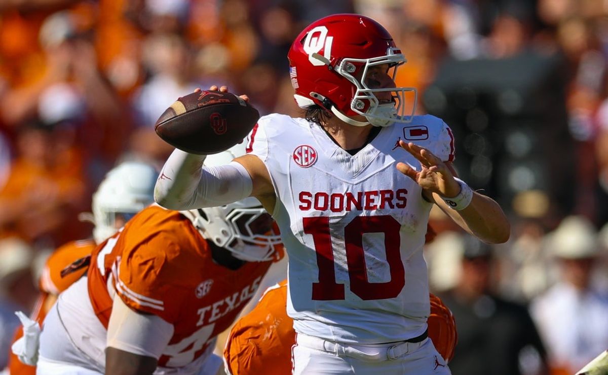 Oct 11, 2025; Dallas, Texas, USA;  Oklahoma Sooners quarterback John Mateer (10) throws during the first half against the Texas Longhorns at the Cotton Bowl. Mandatory Credit: Kevin Jairaj-Imagn Images