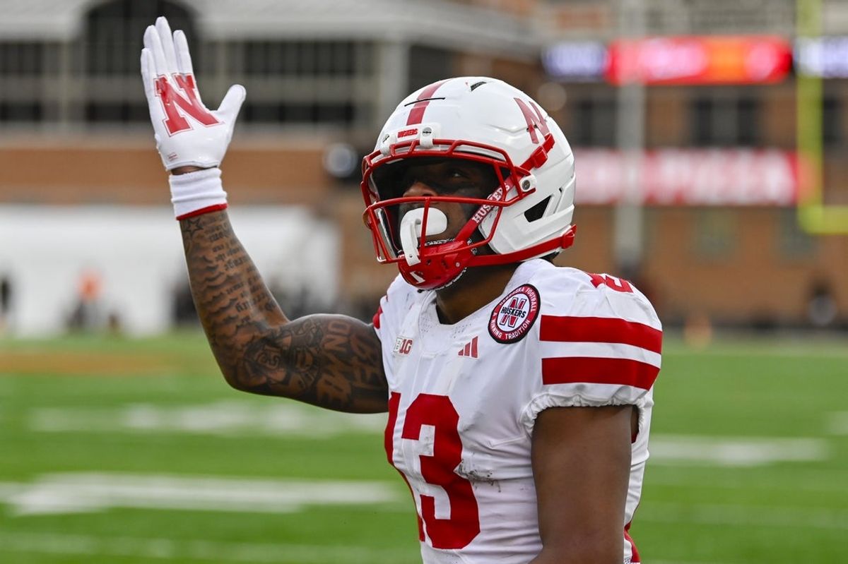 Oct 11, 2025; College Park, Maryland, USA;  Nebraska Cornhuskers defensive back Jamir Conn (13) reacts after scoring a touchdown during the first half against the Maryland Terrapins at SECU Stadium. Mandatory Credit: Tommy Gilligan-Imagn Images