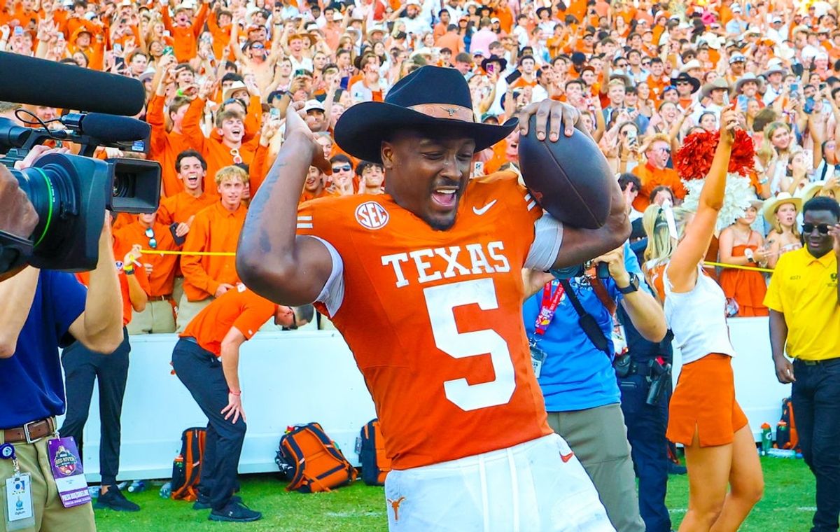 Oct 11, 2025; Dallas, Texas, USA;  Texas Longhorns running back Quintrevion Wisner (5) celebrates after the game against the Oklahoma Sooners at the Cotton Bowl. Mandatory Credit: Kevin Jairaj-Imagn Images
