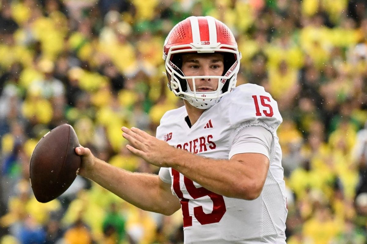 Oct 11, 2025; Eugene, Oregon, USA; Indiana Hoosiers quarterback Fernando Mendoza (15) prepares to throw the ball against the Oregon Ducks during the fourth quarter at Autzen Stadium. Mandatory Credit: Troy Wayrynen-Imagn Images