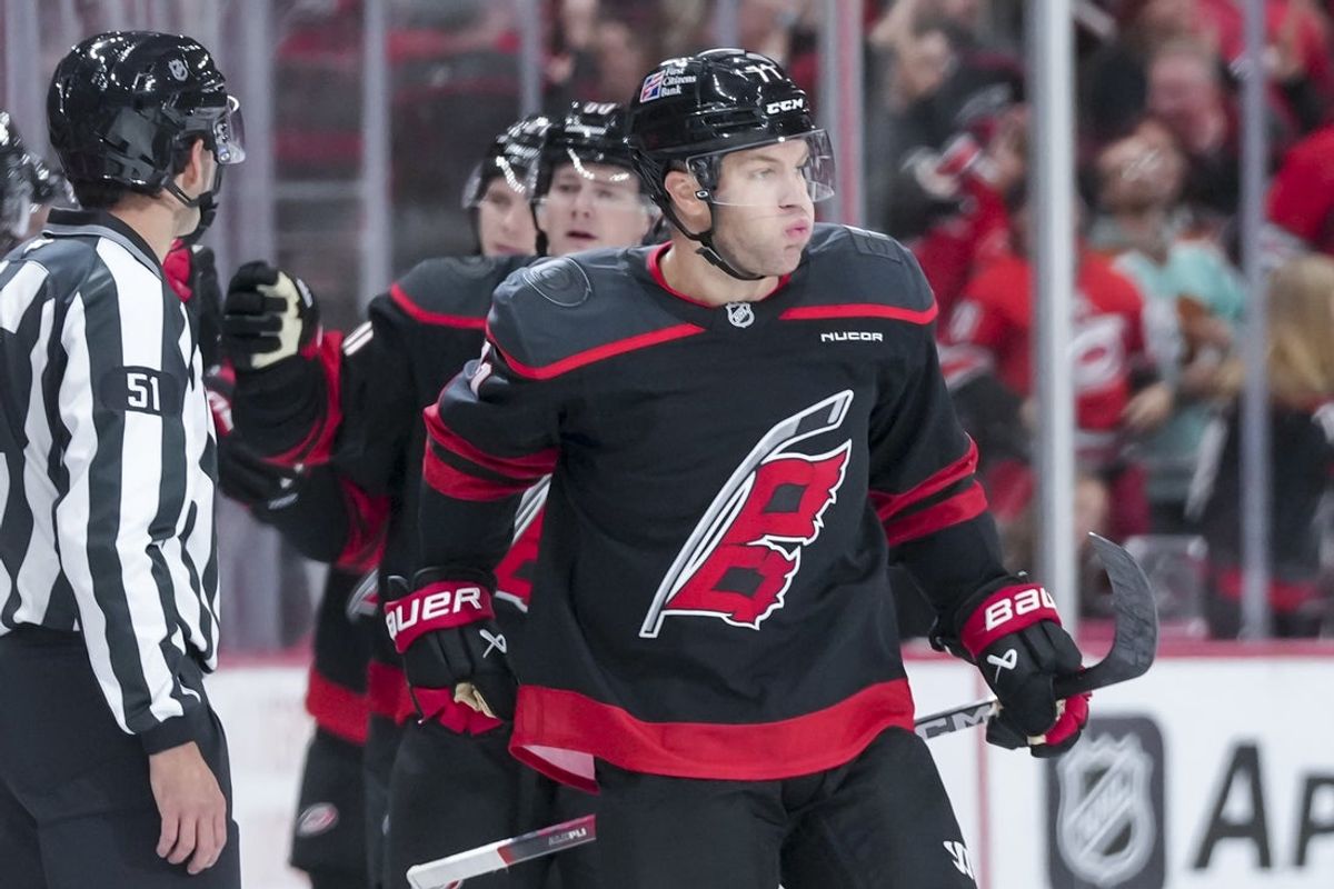Oct 11, 2025; Raleigh, North Carolina, USA; Carolina Hurricanes left wing Taylor Hall (71) celebrates his goal against the Philadelphia Flyers during the second period at Lenovo Center. Mandatory Credit: James Guillory-Imagn Images