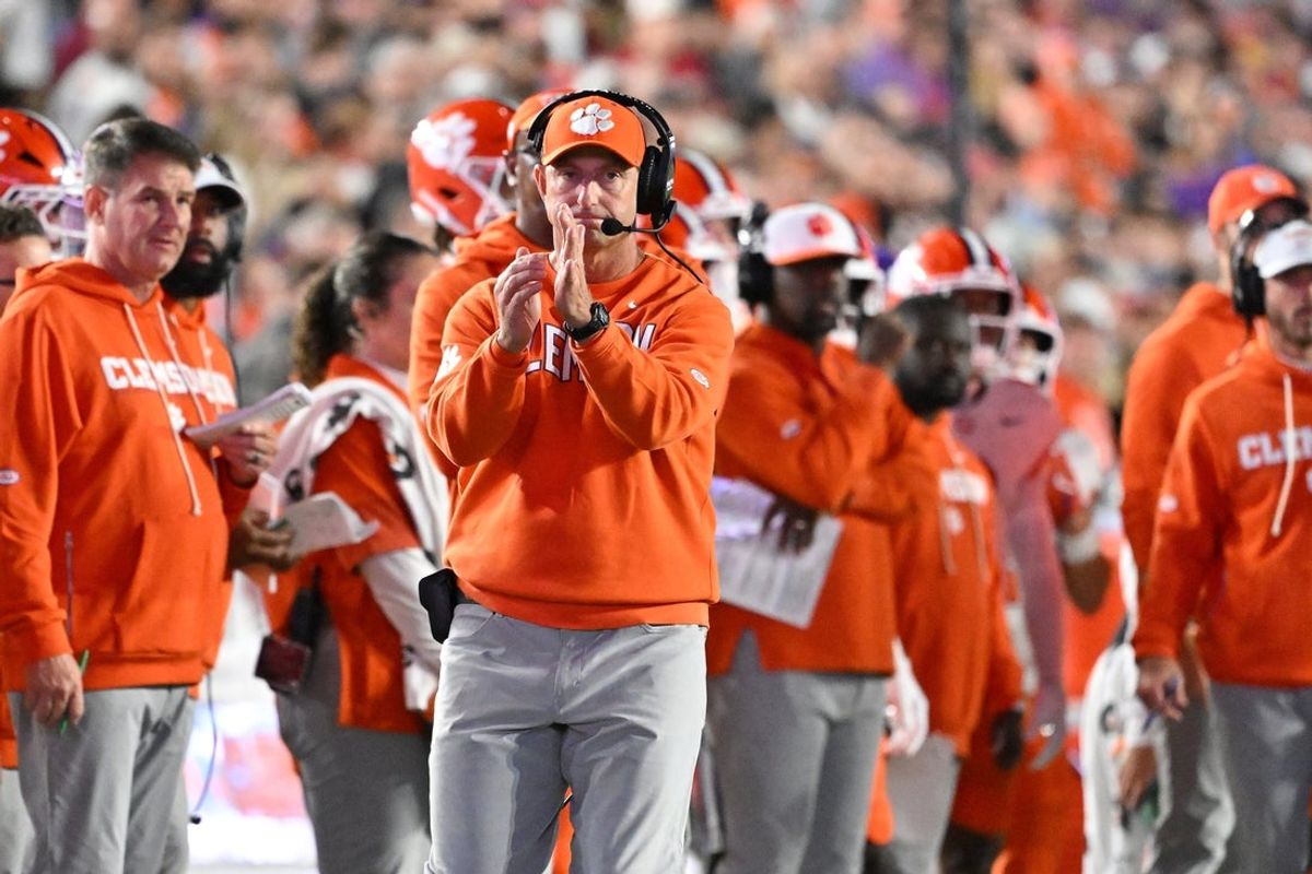 Oct 11, 2025; Chestnut Hill, Massachusetts, USA; Clemson Tigers head coach Dabo Swinney calls time out during the first half against the Boston College Eagles at Alumni Stadium. Mandatory Credit: Eric Canha-Imagn Images