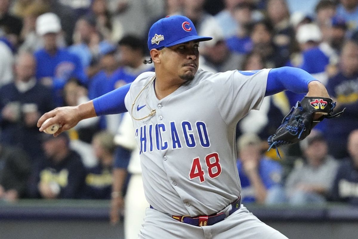 Oct 11, 2025; Milwaukee, Wisconsin, USA; Chicago Cubs pitcher Daniel Palencia (48) pitches against the Milwaukee Brewers in the fifth inning during game five of the NLDS round for the 2025 MLB playoffs at American Family Field. Mandatory Credit: Michael McLoone-Imagn Images