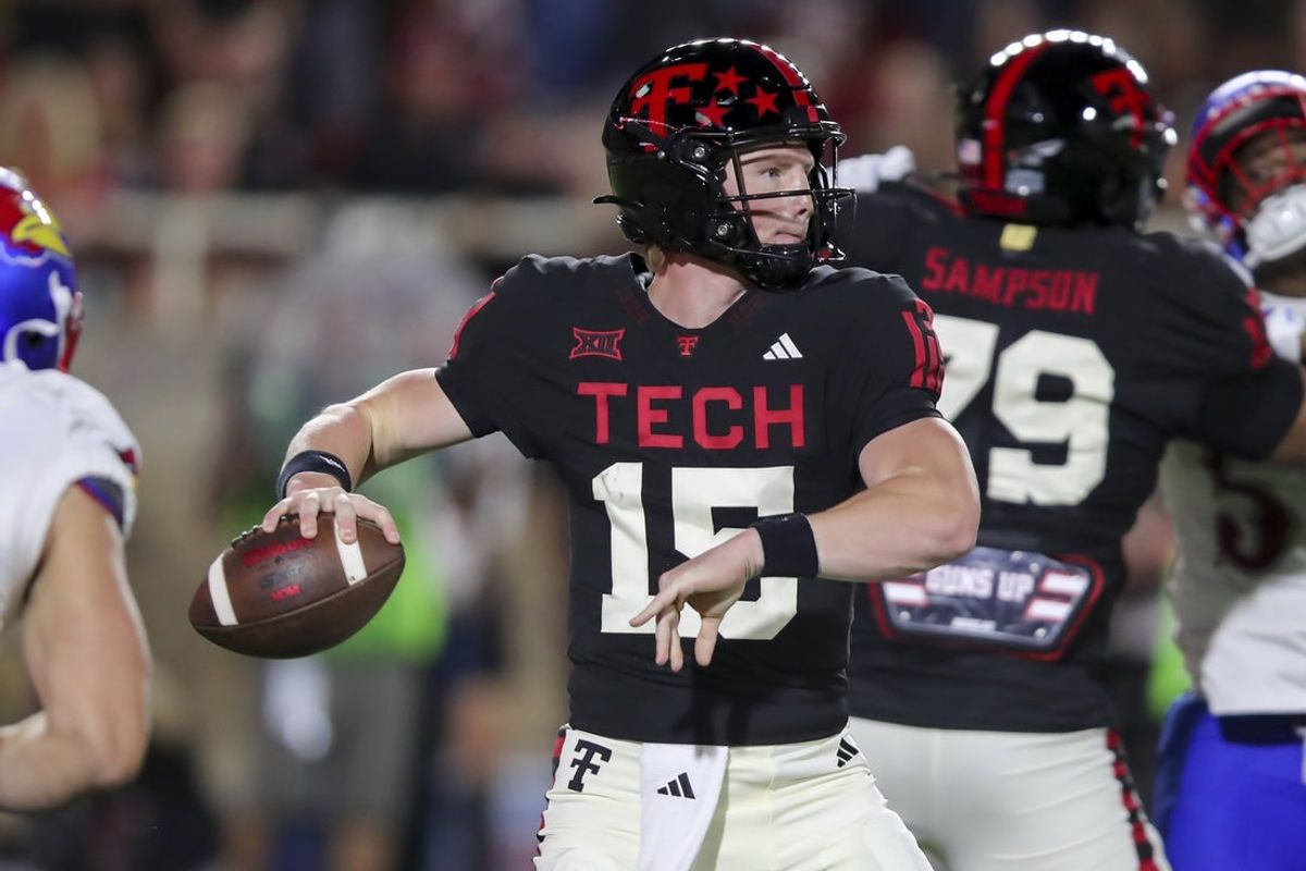 Oct 11, 2025; Lubbock, Texas, USA; Texas Tech Red Raiders quarterback Will Hammond (15) passes the ball in the first half at Jones AT&T Stadium. Mandatory Credit: Michael C. Johnson-Imagn Images