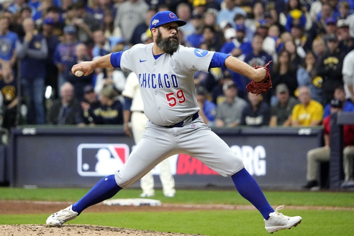 Oct 11, 2025; Milwaukee, Wisconsin, USA; Chicago Cubs pitcher Andrew Kittredge (59) pitches against the Milwaukee Brewers in the sixth inning during game five of the NLDS round for the 2025 MLB playoffs at American Family Field. Mandatory Credit: Michael McLoone-Imagn Images