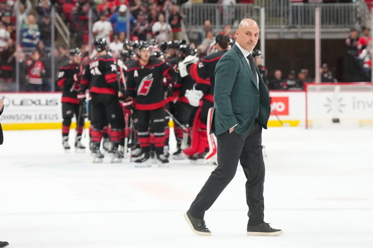 Oct 11, 2025; Raleigh, North Carolina, USA;  Philadelphia Flyers head coach Rick Tocchet walks off the ice after the overrate lose to the Carolina Hurricanes at Lenovo Center. Mandatory Credit: James Guillory-Imagn Images