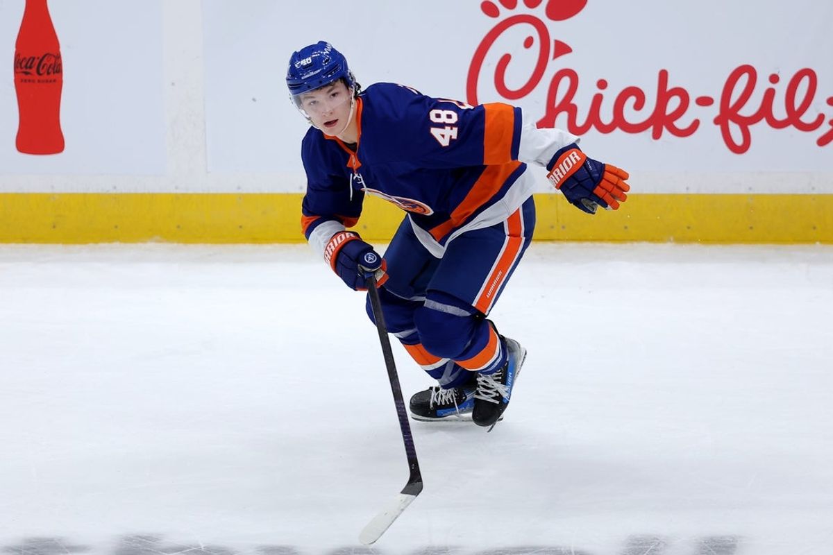Oct 11, 2025; Elmont, New York, USA; New York Islanders defenseman Matthew Schaefer (48) skates against the Washington Capitals during the third period at UBS Arena. Mandatory Credit: Brad Penner-Imagn Images