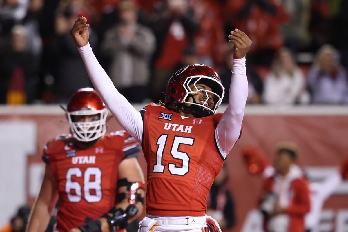 Oct 11, 2025; Salt Lake City, Utah, USA; Utah Utes quarterback Byrd Ficklin (15) celebrates scoring a touchdown against the Arizona State Sun Devils during the fourth quarter at Rice-Eccles Stadium. Mandatory Credit: Rob Gray-Imagn Images