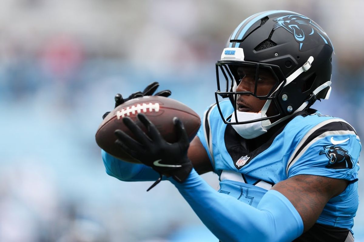 Oct 12, 2025; Charlotte, North Carolina, USA; Carolina Panthers cornerback Corey Thornton (31) makes a catch during warmups prior to the game against the Dallas Cowboys at Bank of America Stadium. Mandatory Credit: Cory Knowlton-Imagn Images