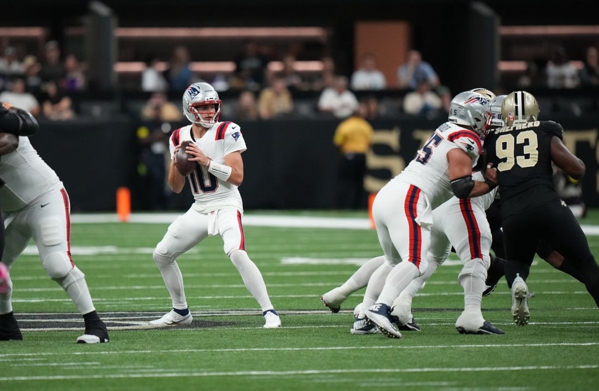 Oct 12, 2025; New Orleans, Louisiana, USA; New England Patriots quarterback Drake Maye (10) looks to throw downfield during the first quarter against the New Orleans Saints at Caesars Superdome. Mandatory Credit: Matthew Hinton-Imagn Images