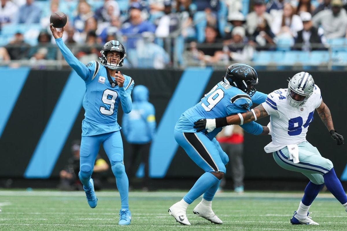 Oct 12, 2025; Charlotte, North Carolina, USA; Carolina Panthers quarterback Bryce Young (9) throws the ball during the second quarter against the Dallas Cowboys at Bank of America Stadium. Mandatory Credit: Cory Knowlton-Imagn Images