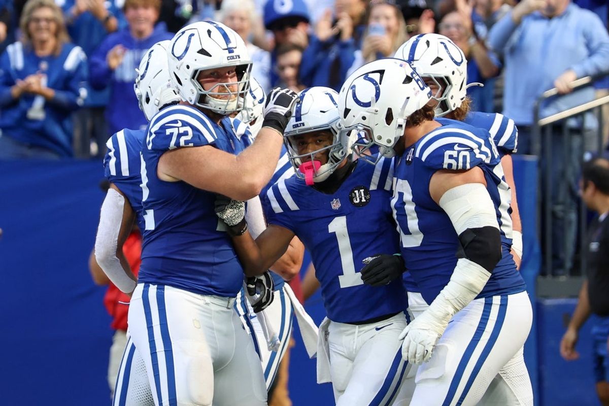 Oct 12, 2025; Indianapolis, Indiana, USA; Indianapolis Colts wide receiver Josh Downs (1) celebrates after scoring a touchdown against the Arizona Cardinals during the fourth quarter of the game at Lucas Oil Stadium. Mandatory Credit: Trevor Ruszkowski-Imagn Images