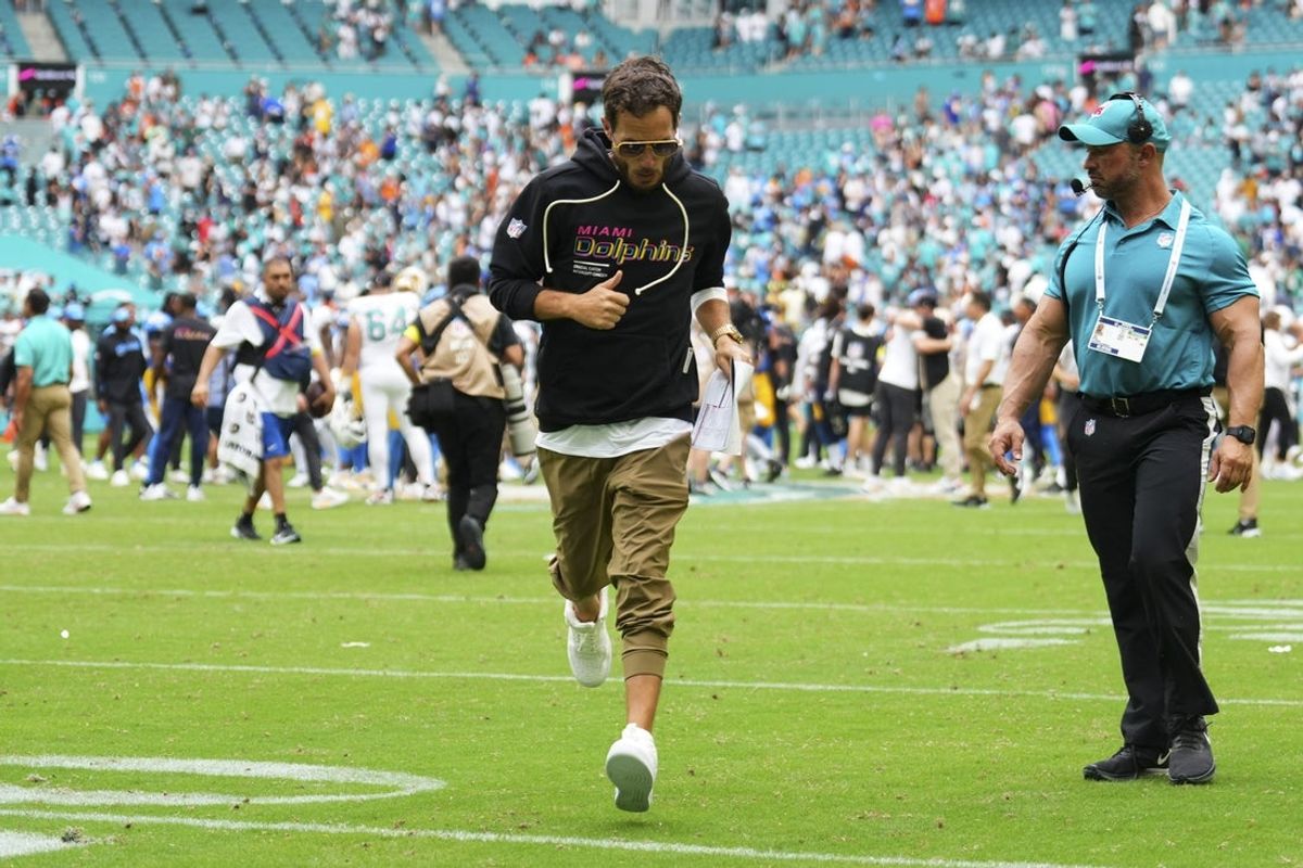 Oct 12, 2025; Miami Gardens, Florida, USA; Miami Dolphins head coach Mike McDaniel leaves the field at the end of a game against the Los Angeles Chargers at Hard Rock Stadium. Mandatory Credit: Rich Storry-Imagn Images