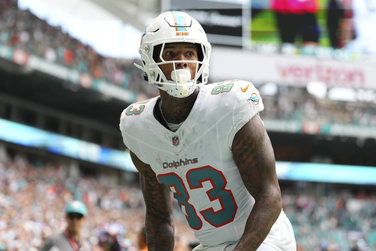 Oct 12, 2025; Miami Gardens, Florida, USA; Miami Dolphins tight end Darren Waller (83) celebrates after scoring a touchdown against the Los Angeles Chargers during the fourth quarter at Hard Rock Stadium. Mandatory Credit: Rich Storry-Imagn Images