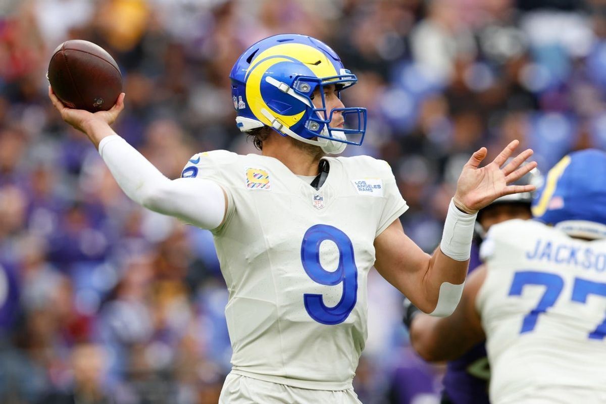 Oct 12, 2025; Baltimore, Maryland, USA; Los Angeles Rams quarterback Matthew Stafford (9) passes the ball against the Baltimore Ravens during the second half of the game at M&T Bank Stadium. Mandatory Credit: Peter Casey-Imagn Images