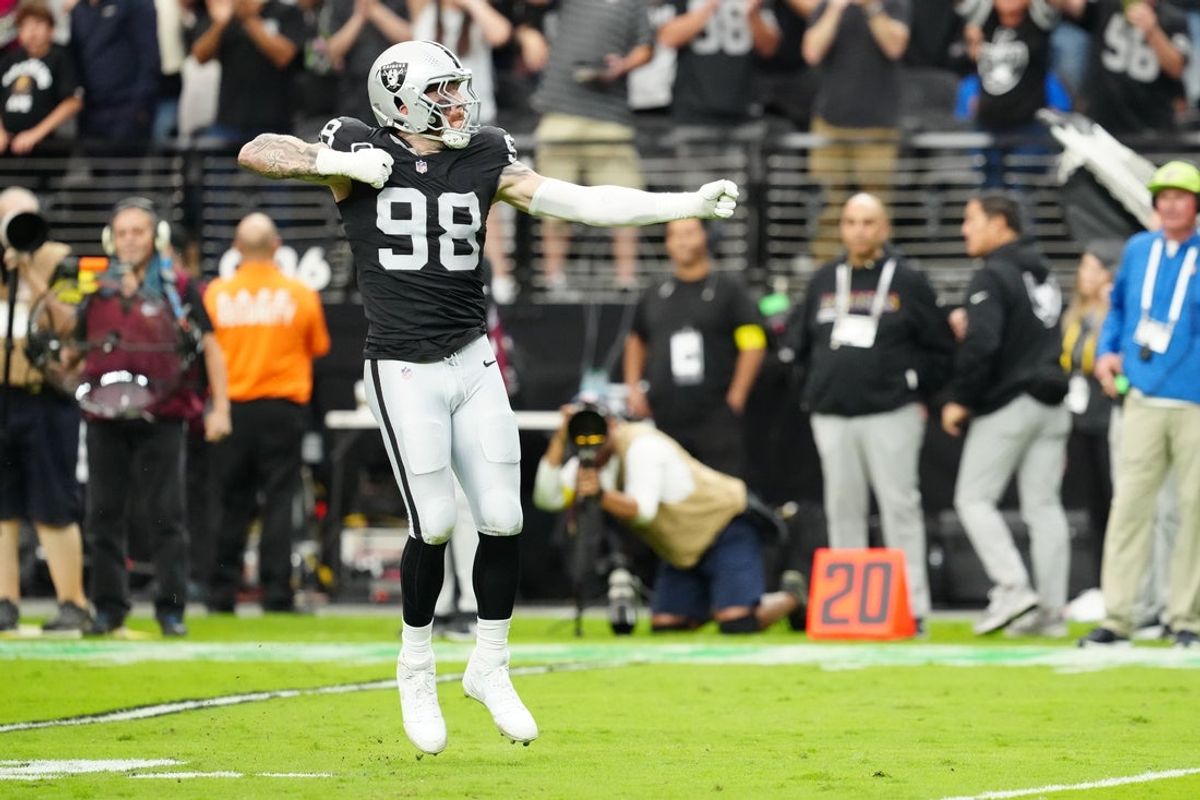Oct 12, 2025; Paradise, Nevada, USA; Las Vegas Raiders defensive end Maxx Crosby (98) reacts after a play during the second half against the Tennessee Titans at Allegiant Stadium. Mandatory Credit: Stephen R. Sylvanie-Imagn Images