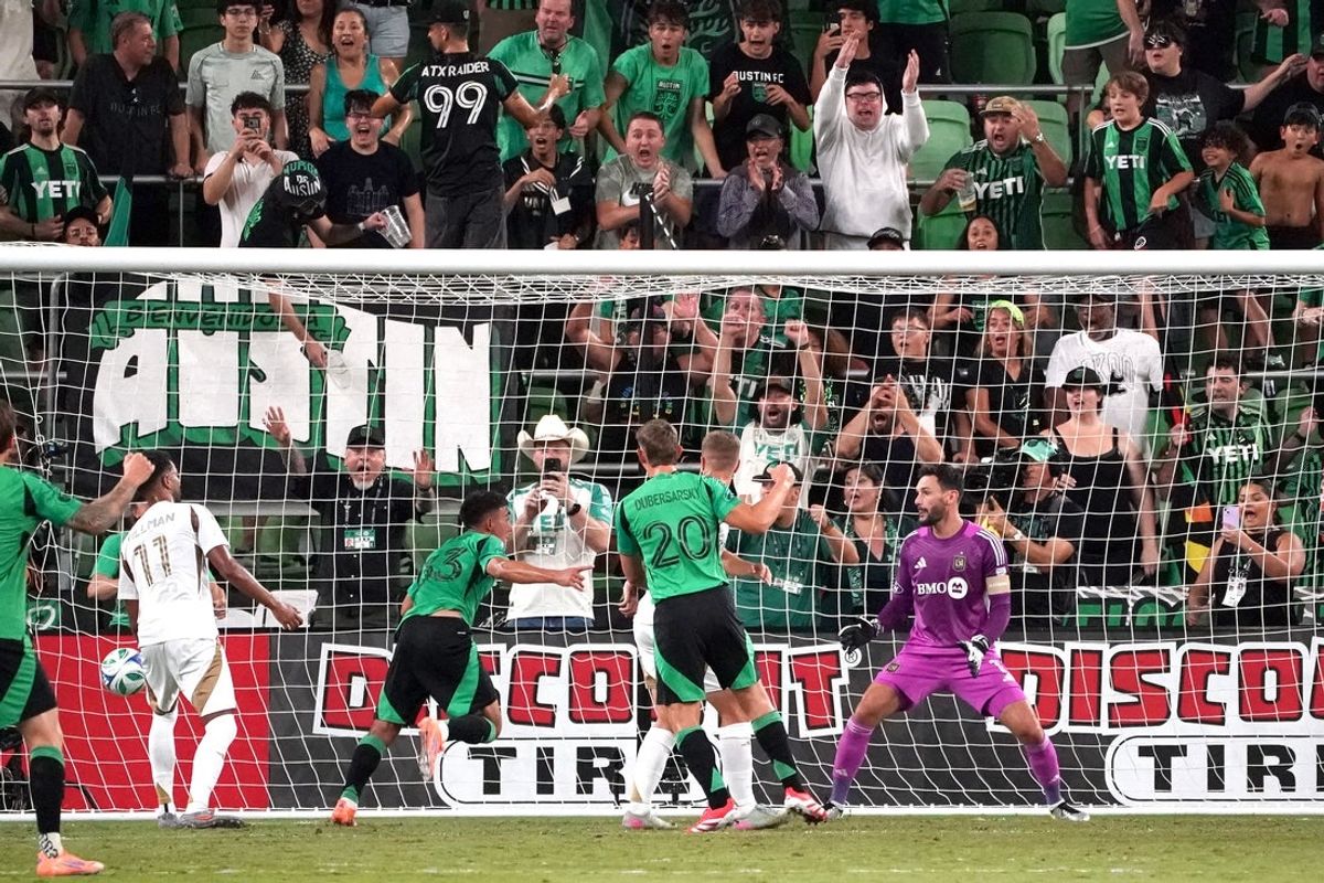 Oct 12, 2025; Austin, Texas, USA; Austin FC midfielder Owen Wolff (33) makes a goal past LAFC goalkeeper Hugo Lloris (1) during the second half at Q2 Stadium. Mandatory Credit: Dustin Safranek-Imagn Images