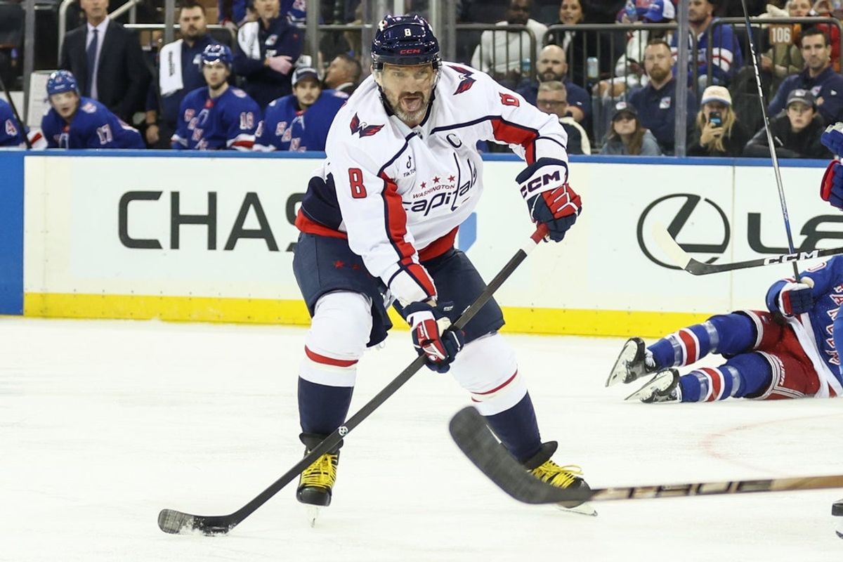 Oct 12, 2025; New York, New York, USA;  Washington Capitals left wing Alex Ovechkin (8) attempts a shot on goal in the third period against the New York Rangers at Madison Square Garden. Mandatory Credit: Wendell Cruz-Imagn Images