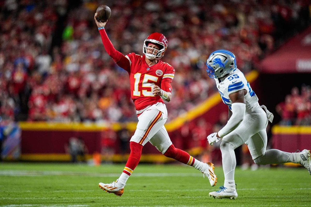 Detroit Lions linebacker Derrick Barnes (55) pressures Kansas City Chiefs quarterback Patrick Mahomes (15) during the first half at Arrowhead Stadium in Kansas City, Missouri on Sunday, Oct. 12, 2025.