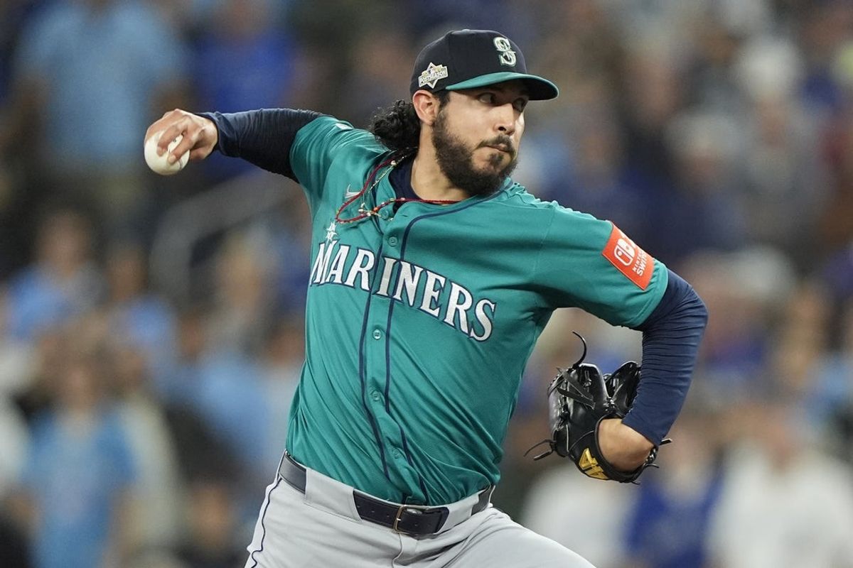 Oct 12, 2025; Toronto, Ontario, CAN; Seattle Mariners pitcher Andres Munoz (75) pitches in the ninth inning against the Toronto Blue Jays during game one of the ALCS round for the 2025 MLB playoffs at Rogers Centre. Mandatory Credit: John E. Sokolowski-Imagn Images