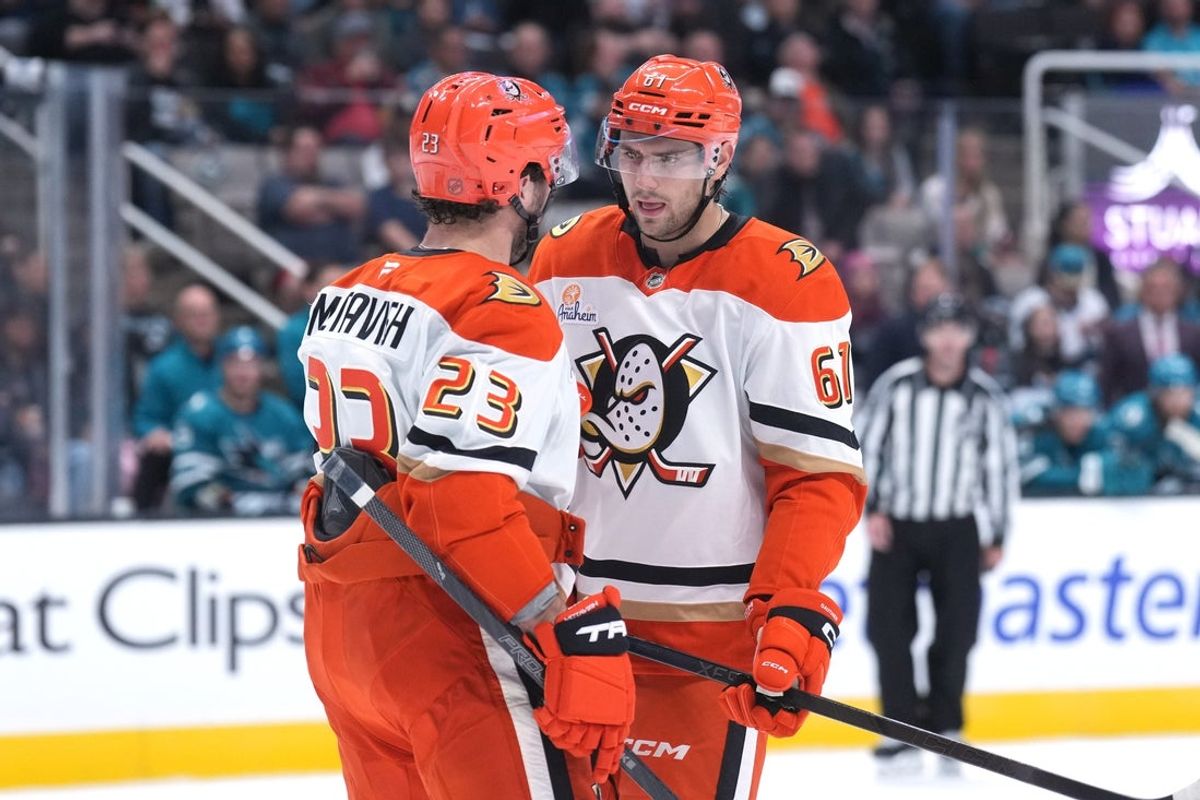 Oct 11, 2025; San Jose, California, USA; Anaheim Ducks center Mason McTavish (23) and left wing Cutter Gauthier (61) talk during the first period against the San Jose Sharks at SAP Center at San Jose. Mandatory Credit: Darren Yamashita-Imagn Images