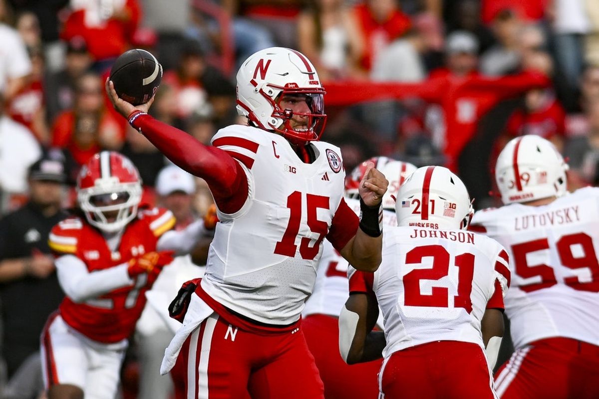 Oct 11, 2025; College Park, Maryland, USA;  Nebraska Cornhuskers quarterback Dylan Raiola (15) throws from the pocket during the game against the Maryland Terrapins at SECU Stadium. Mandatory Credit: Tommy Gilligan-Imagn Images