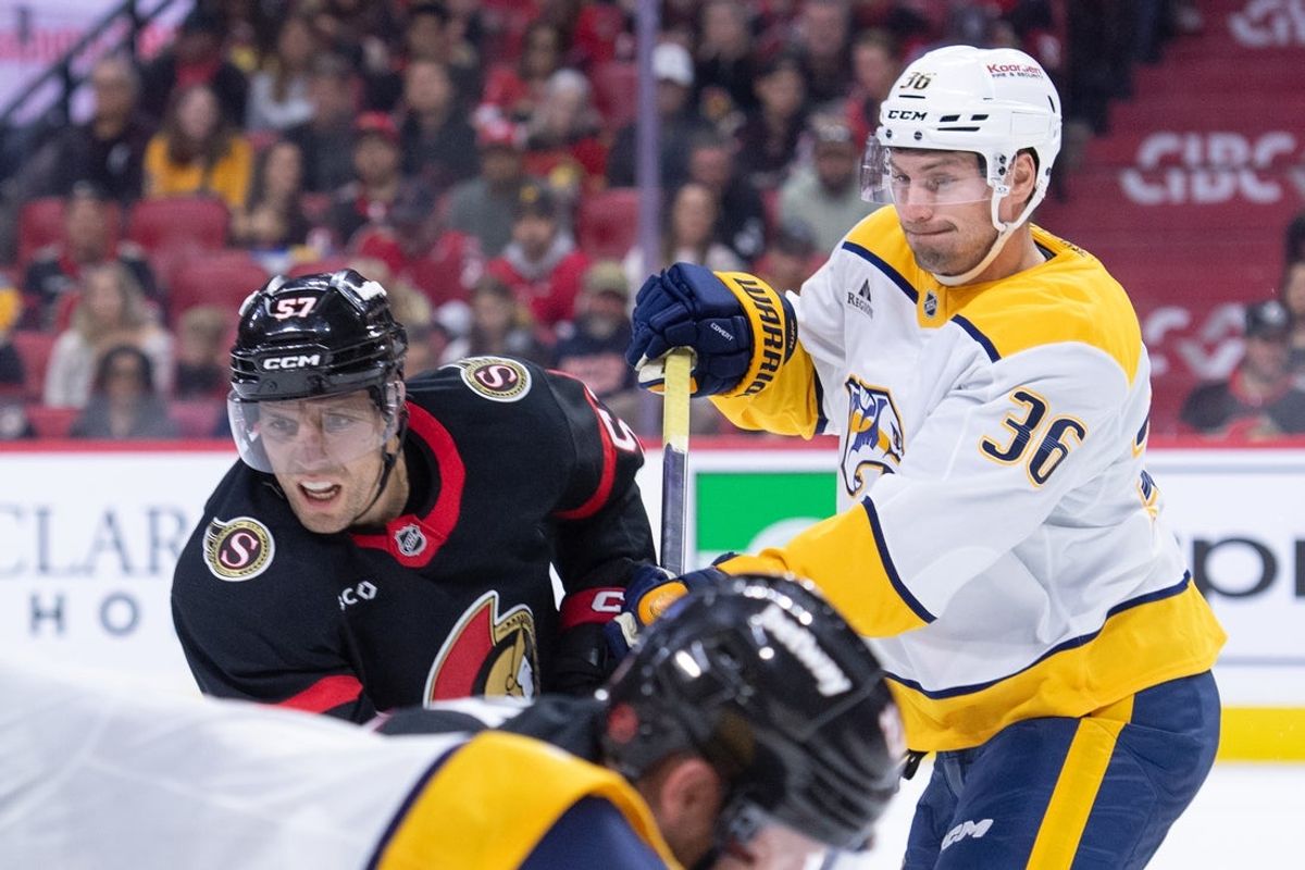 Oct 13, 2025; Ottawa, Ontario, CAN; Ottawa Senators left wing David Perron (57) goes after the puck after battling with Nashville Predators  left wing Cole Smith (36) in the first period at the Canadian Tire Centre. Mandatory Credit: Marc DesRosiers-Imagn Images