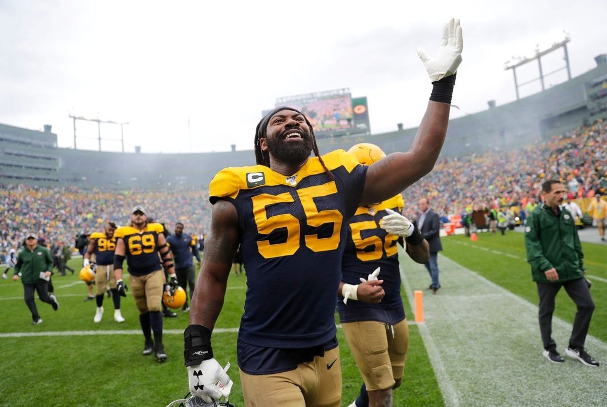 Green Bay Packers outside linebacker Za'Darius Smith (55) celebrates a 27-16 victory against the Denver Broncos Sunday, Sept. 22, 2019, at Lambeau Field in Green Bay, Wis.