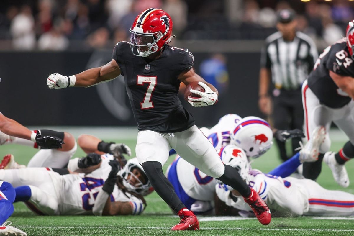 Oct 13, 2025; Atlanta, Georgia, USA; Atlanta Falcons running back Bijan Robinson (7) carries the ball against the Buffalo Bills during the first half of a game at Mercedes-Benz Stadium. Mandatory Credit: Brett Davis-Imagn Images