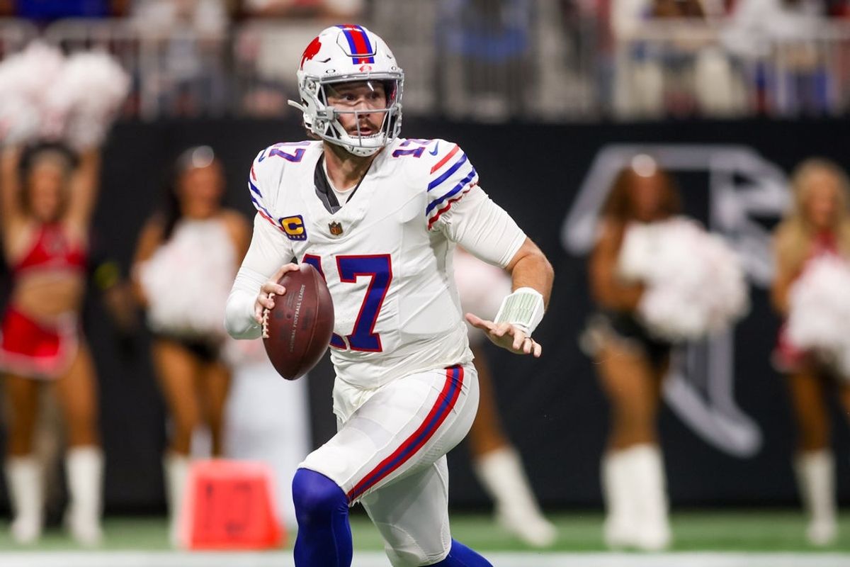 Oct 13, 2025; Atlanta, Georgia, USA; Buffalo Bills quarterback Josh Allen (17) looks downfield against the Atlanta Falcons during the first half of a game at Mercedes-Benz Stadium. Mandatory Credit: Brett Davis-Imagn Images