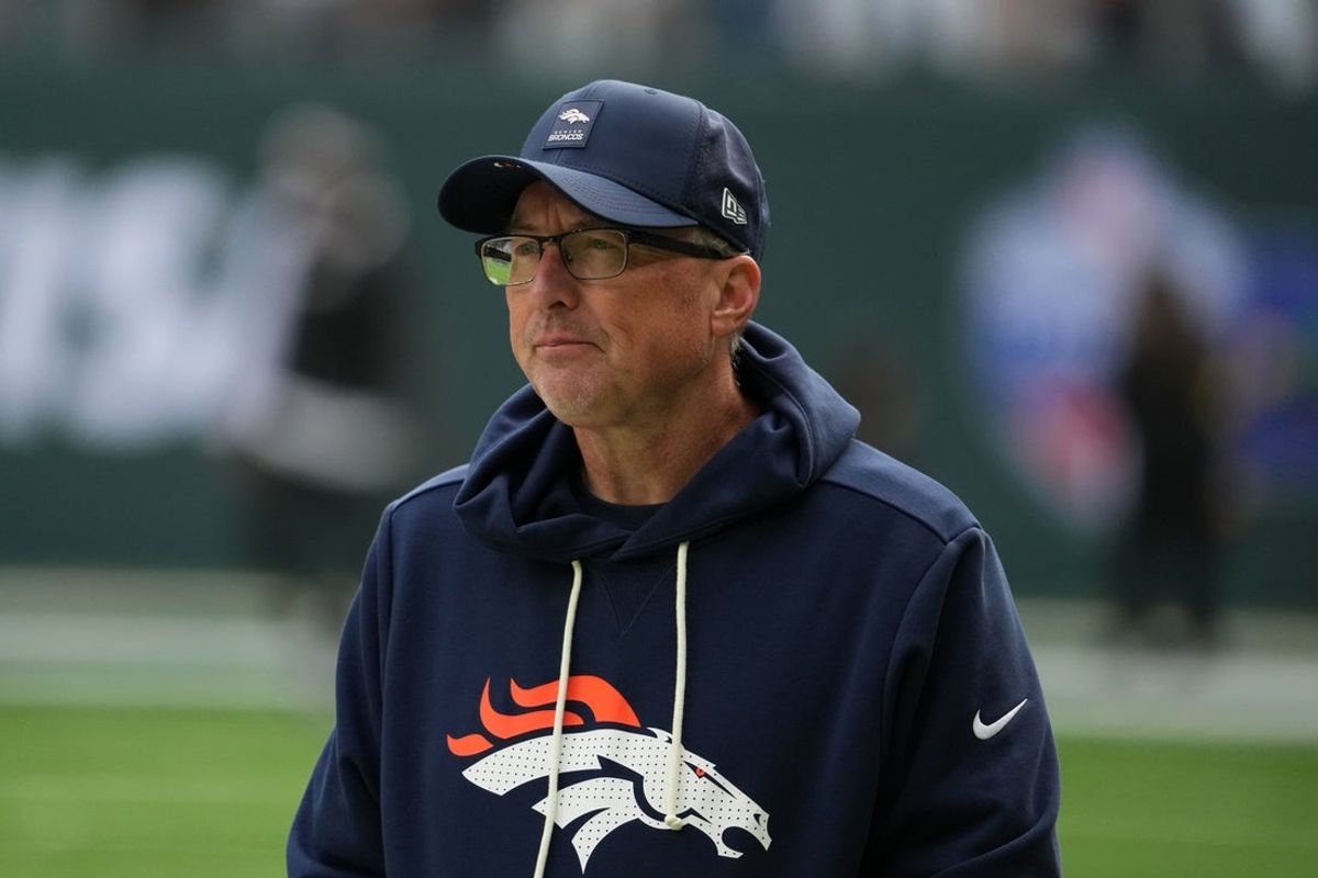 Oct 12, 2025; Tottenham, United Kingdom; Denver Broncos senior offensive assistant coach Pete Carmichael watches during an NFL International Series game against the New York Jets at Tottenham Hotspur Stadium. Mandatory Credit: Kirby Lee-Imagn Images