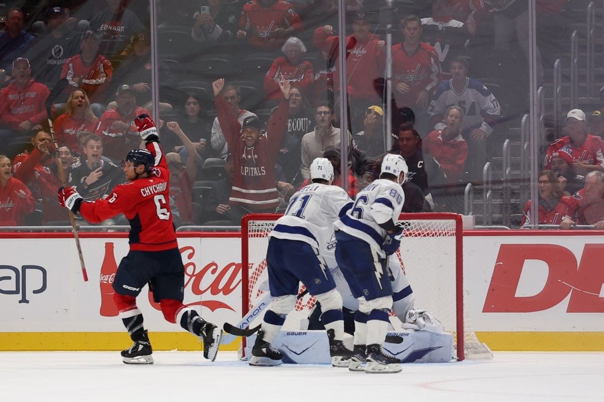 Oct 14, 2025; Washington, District of Columbia, USA; Washington Capitals defenseman Jakob Chychrun (6) celebrates after scoring the game winning goal on Tampa Bay Lightning goaltender Andrei Vasilevskiy (88) in overtime at Capital One Arena. Mandatory Credit: Geoff Burke-Imagn Images
