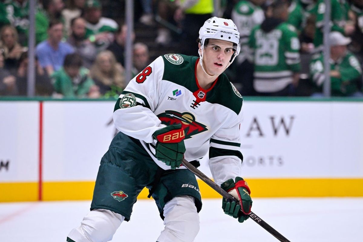 Oct 14, 2025; Dallas, Texas, USA; Minnesota Wild defenseman Zeev Buium (8) skates against the Dallas Stars during the second period at the American Airlines Center. Mandatory Credit: Jerome Miron-Imagn Images