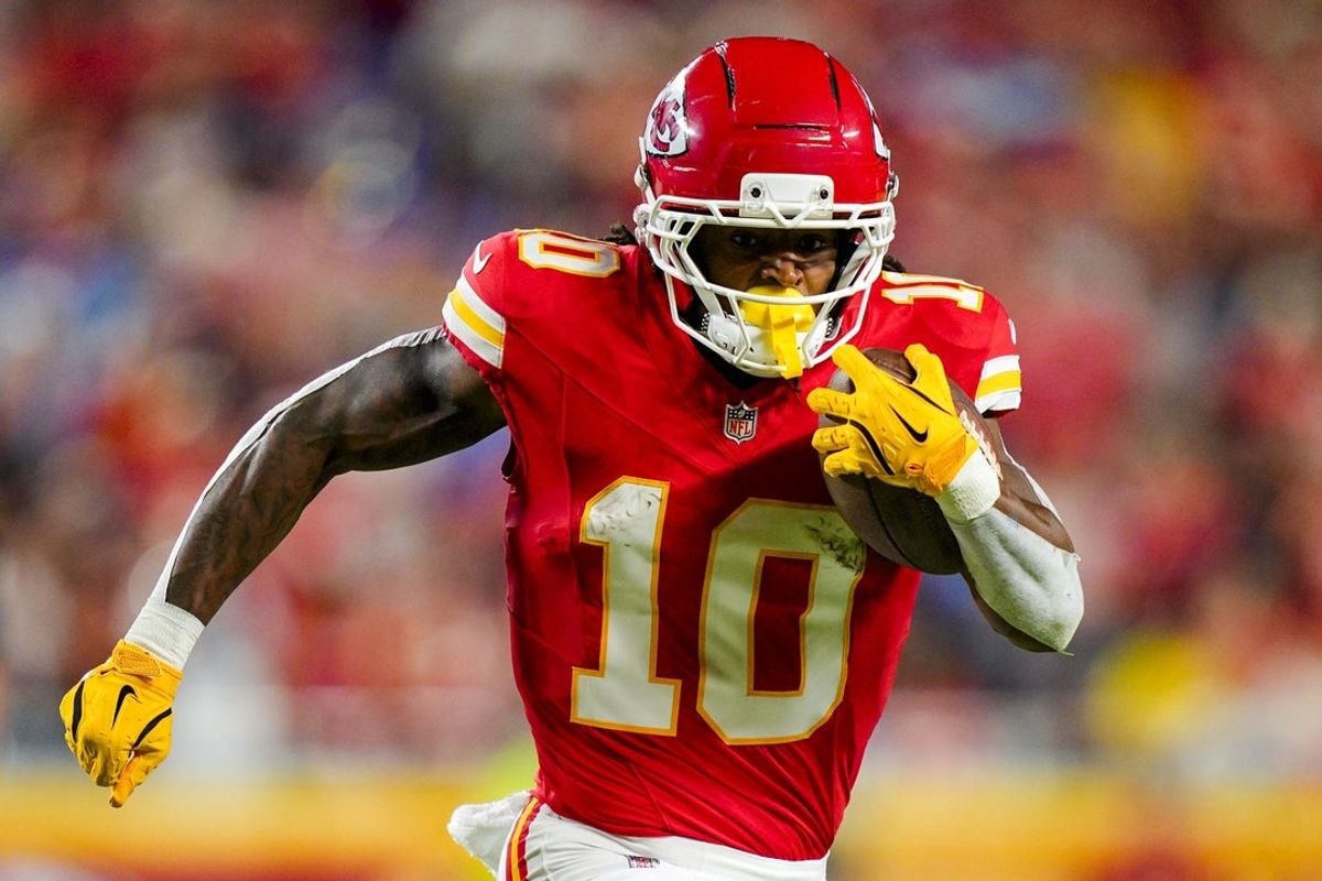Oct 12, 2025; Kansas City, Missouri, USA; Kansas City Chiefs running back Isiah Pacheco (10) runs the ball during the first half against the Detroit Lions at GEHA Field at Arrowhead Stadium. Mandatory Credit: Jay Biggerstaff-Imagn Images