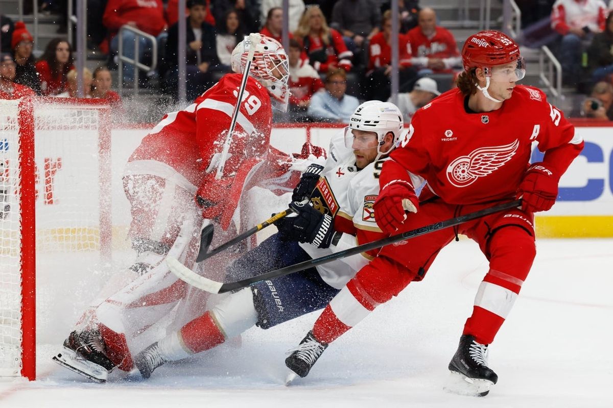 Oct 15, 2025; Detroit, Michigan, USA;  Florida Panthers center Sam Bennett (9) skates in on Detroit Red Wings goaltender Cam Talbot (39) defended by defenseman Moritz Seider (53) in the first period at Little Caesars Arena. Mandatory Credit: Rick Osentoski-Imagn Images