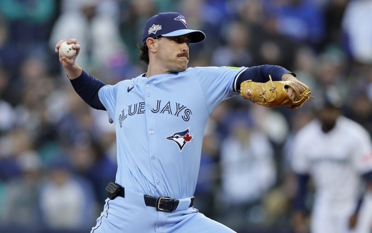 Oct 15, 2025; Seattle, Washington, USA;  Toronto Blue Jays pitcher Shane Bieber (57) throws in the first inning against the Seattle Mariners during game three of the ALCS round for the 2025 MLB playoffs at T-Mobile Park. Mandatory Credit: John Froschauer-Imagn Images