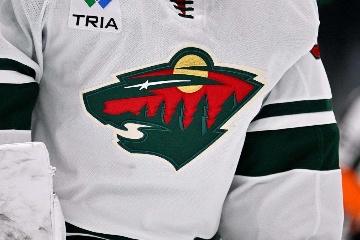Oct 14, 2025; Dallas, Texas, USA; A view of the Minnesota Wild logo during the game between the Dallas Stars and the Minnesota Wild at American Airlines Center. Mandatory Credit: Jerome Miron-Imagn Images