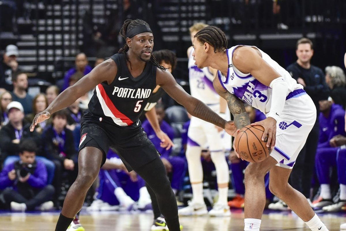 Oct 16, 2025; Salt Lake City, Utah, USA; Portland Trail Blazers guard Jrue Holiday (5) guards Utah Jazz guard Keyonte George (3) during the first half at Delta Center. Mandatory Credit: Peter Creveling-Imagn Images
