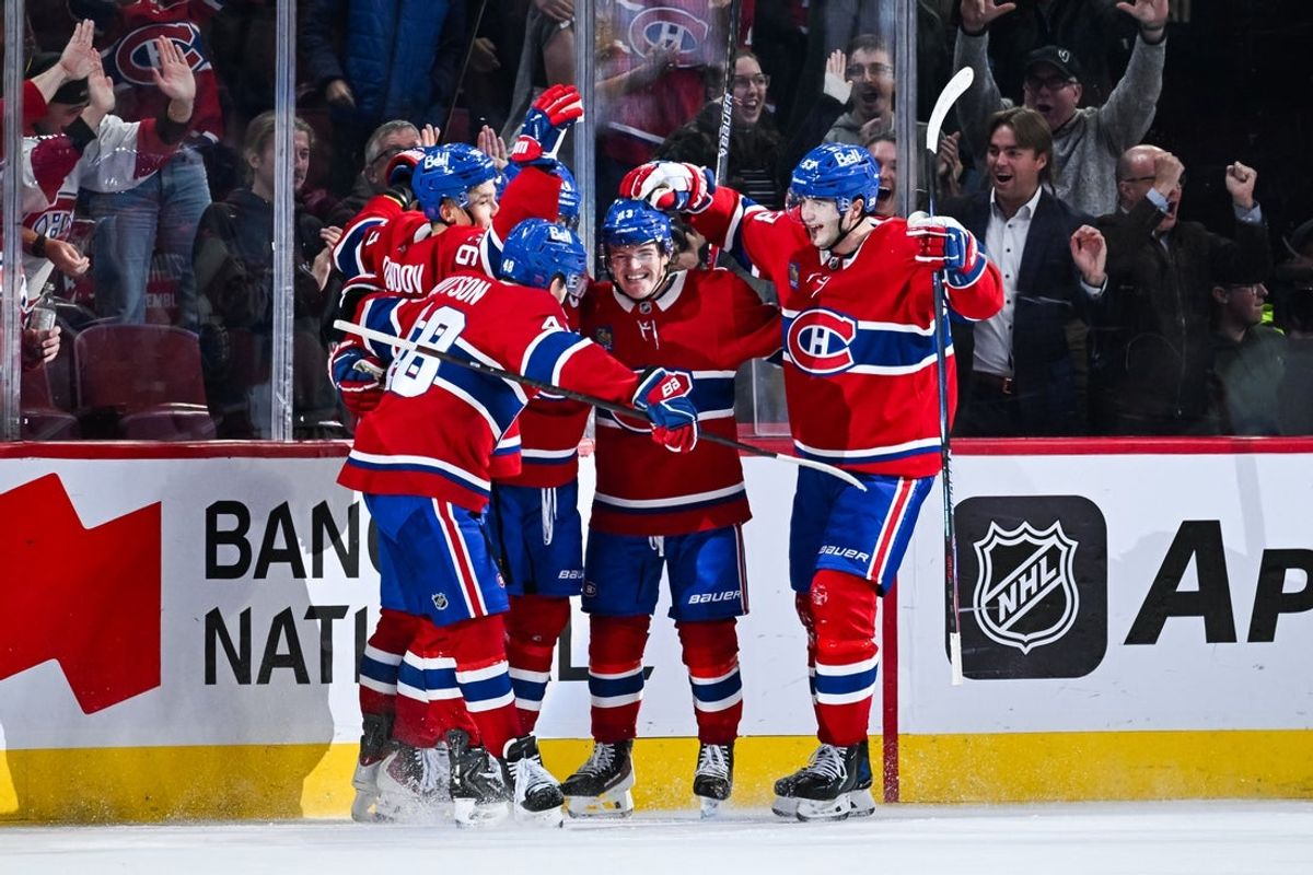 Oct 16, 2025; Montreal, Quebec, CAN; Montreal Canadiens right wing Cole Caufield (13) celebrates his goal against the Nashville Predators with his teammates during the third period at Bell Centre. Mandatory Credit: David Kirouac-Imagn Images