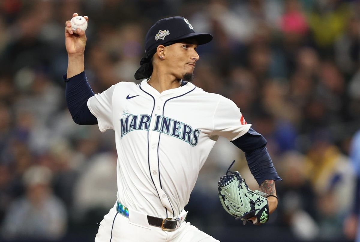 Oct 16, 2025; Seattle, Washington, USA; Seattle Mariners pitcher Carlos Vargas (54) throws in the sixth inning against the Toronto Blue Jays during game four of the ALCS round for the 2025 MLB playoffs at T-Mobile Park. Mandatory Credit: Kevin Ng-Imagn Images