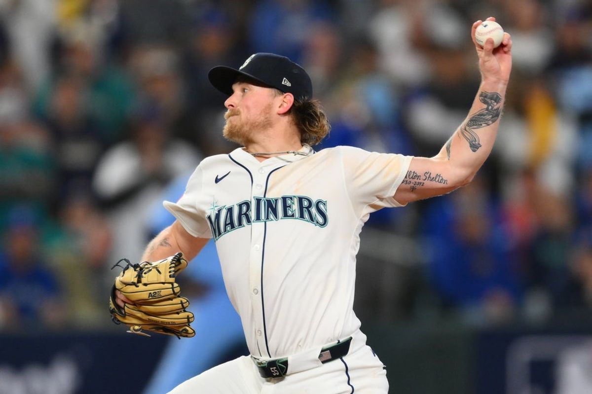 Oct 17, 2025; Seattle, Washington, USA; Seattle Mariners pitcher Gabe Speier (55) pitches against the Toronto Blue Jays during the eighth inning during game five of the ALCS round for the 2025 MLB playoffs at T-Mobile Park. Mandatory Credit: Steven Bisig-Imagn Images