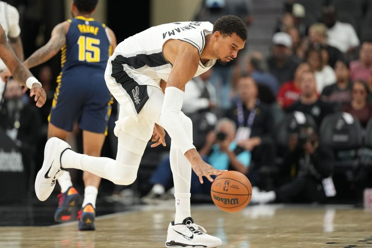 Oct 17, 2025; San Antonio, Texas, USA; San Antonio Spurs forward Victor Wembanyama (1) controls the ball during the second half against the Indiana Pacers at Frost Bank Center. Mandatory Credit: Scott Wachter-Imagn Images