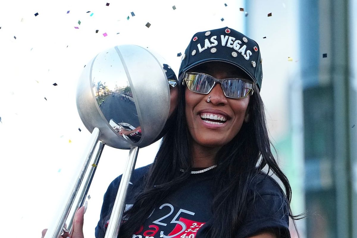 Oct 17, 2025; Las Vegas, NV, USA; Las Vegas Aces center A'Ja Wilson (22) celebrates during the 2025 WNBA Championship parade at Toshiba Plaza. Mandatory Credit: Stephen R. Sylvanie-Imagn Images