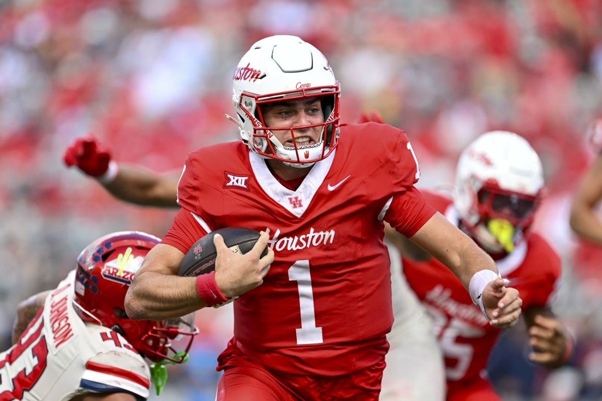 Oct 18, 2025; Houston, Texas, USA; Houston Cougars quarterback Conner Weigman (1) runs the ball into the end zone for a touchdown during the second quarter against the Arizona Wildcats at TDECU Stadium. Mandatory Credit: Maria Lysaker-Imagn Images