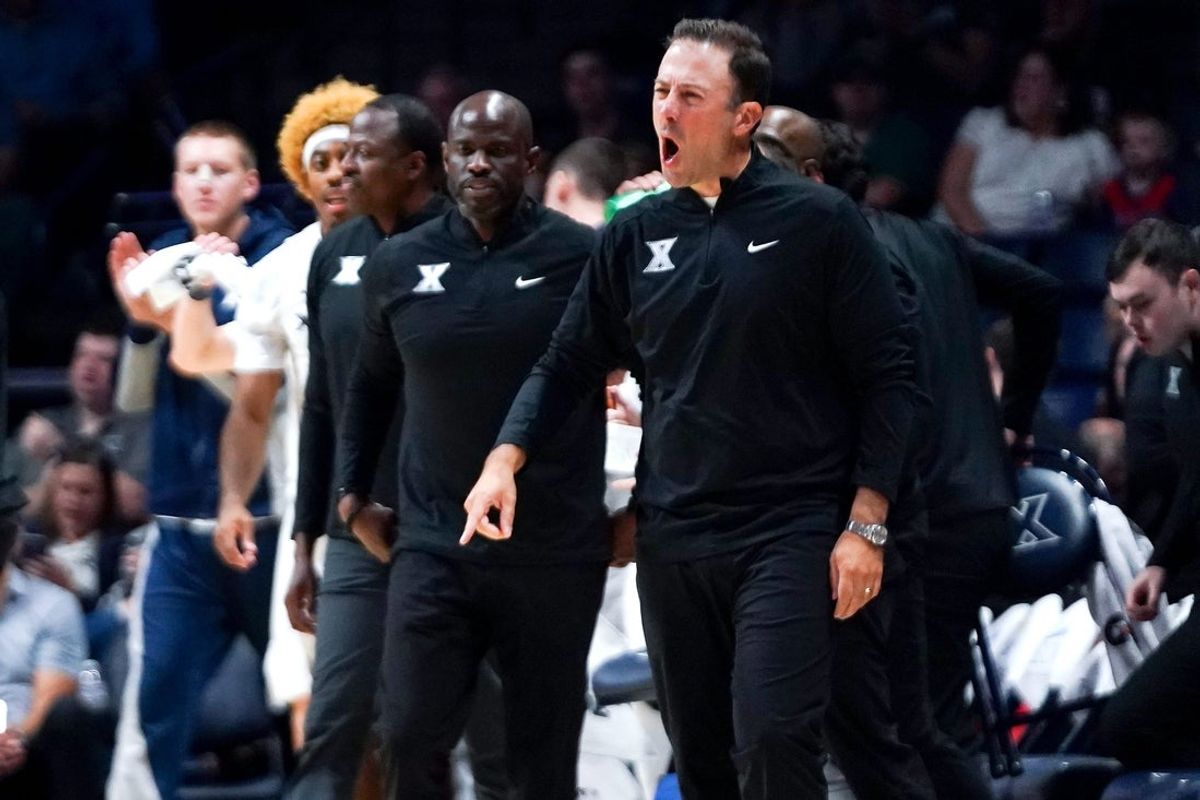 Xavier Musketeers head coach Richard Pitino communicates with a player in the first half of a NCAA men’s basketball game between the Xavier Musketeers and Murray State Racers, Saturday, Oct. 18, 2025, at Cintas Center in Cincinnati.